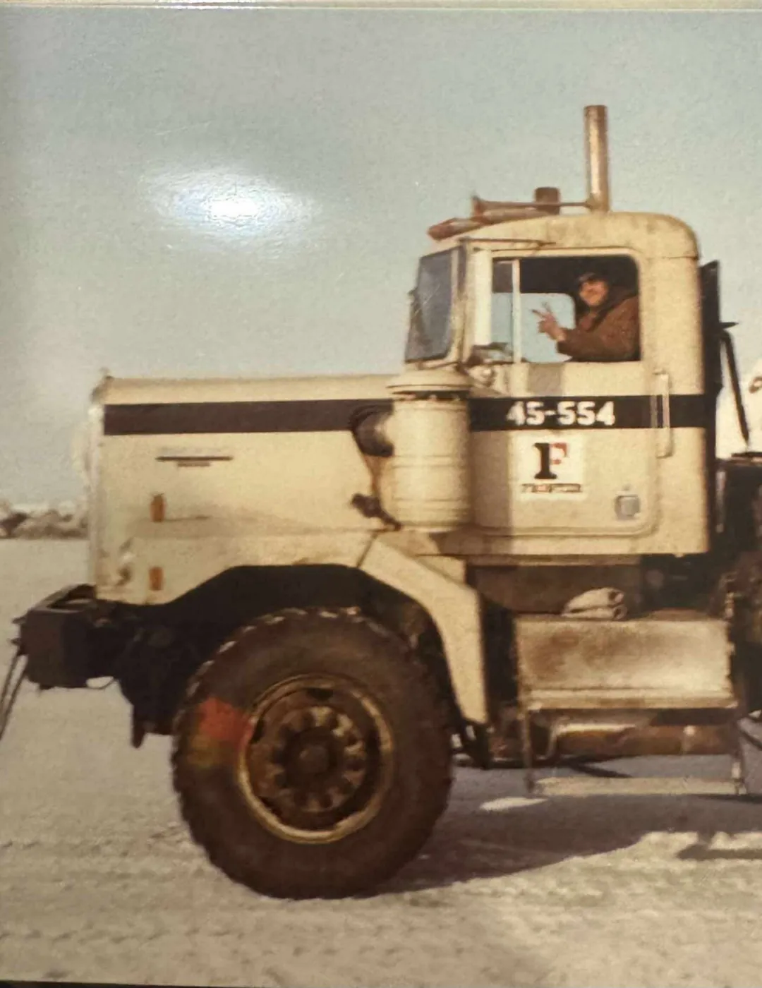 Vintage Frontier tractor truck working on the North Slope in winter
