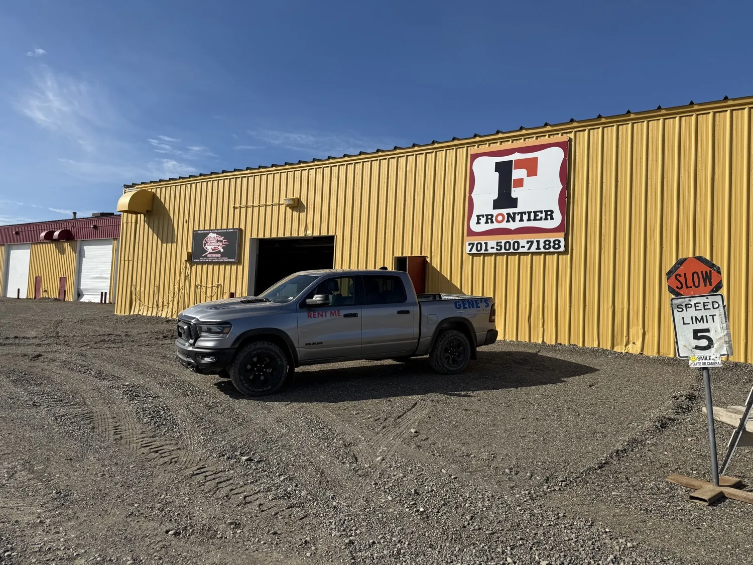 Frontier logo sign on the shop building